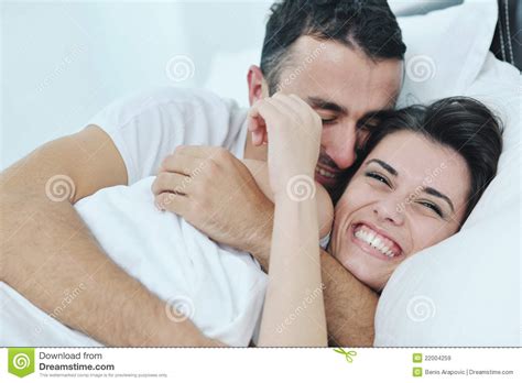 Young Couple Have Good Time In Their Bedroom Royalty Free
