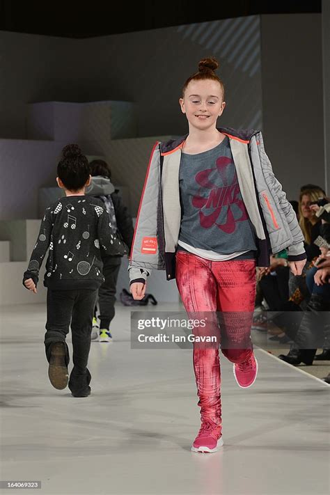 A Model Wearing Nike Look 38 Autumnwinter Walks The Runway At The