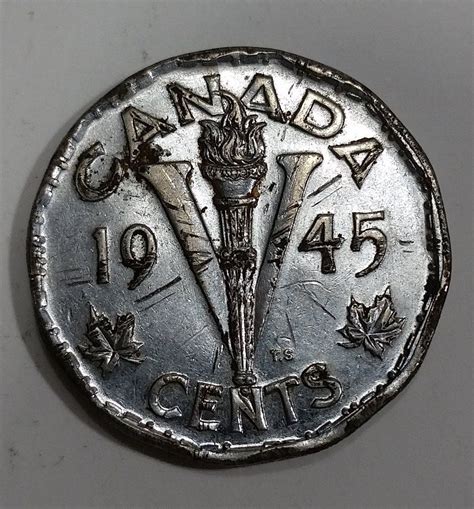 Learn how much your penny is worth by identifying its type. 1945 Canada 5 Cents George VI Victory Canadian Nickel Coin ...