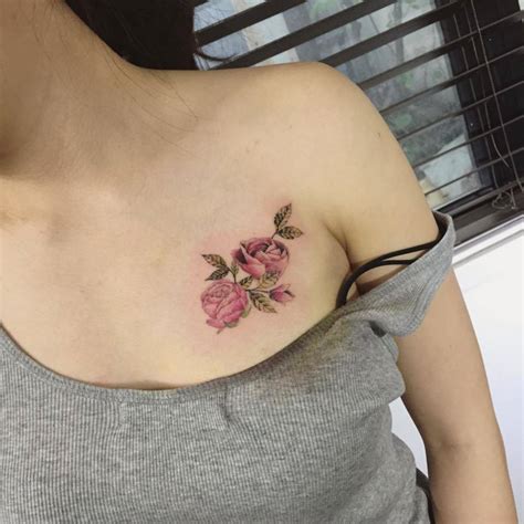 Pink Rose Tattoo On The Chest
