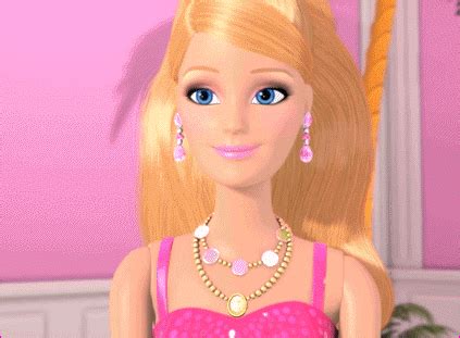The Barbie Doll Is Wearing A Pink Dress
