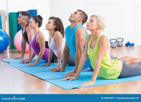 People Doing Yoga Stretch In Gym Class Stock Image Image Of Female