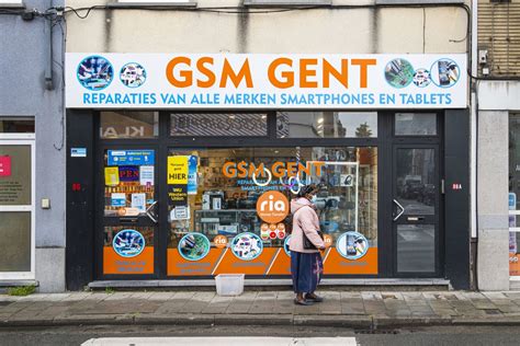 Etalage Van GSM Gent Een Winkel Voor Herstelling Van GSM En Tablet In