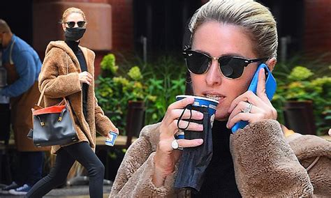 Nicky Hilton Sips On A Drink While Chatting On Her Phone As She Runs