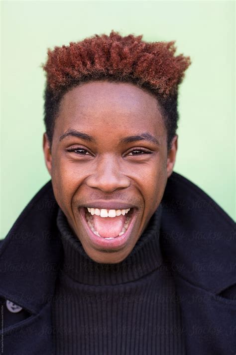 Young Black Man Smiling By Stocksy Contributor Bowery Image Group