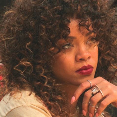 Curly brown hair with blonde highlights. Rihanna, natural curly hair with caramel highlights ...