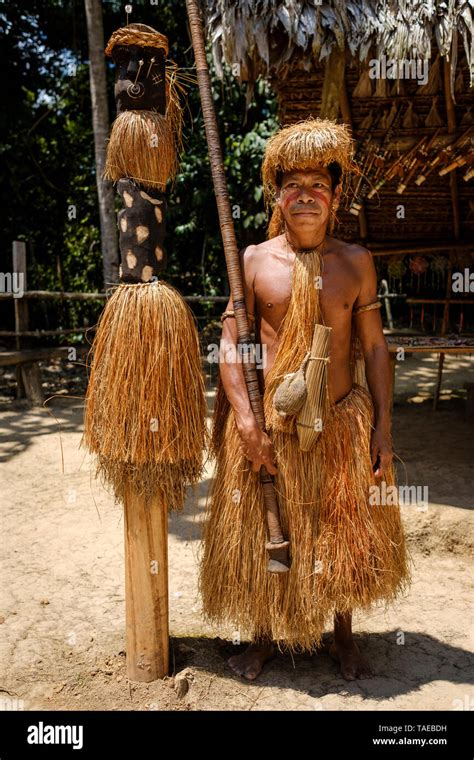 Portrait Of A Yagua Tribe Male Member Holding A Blowpipe Or Pucuna On