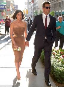 Olivia Munn Highlights Tiny Waist With Cinched Nude Pencil Dress As She