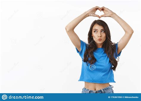 Silly And Dreamy Cute Brunette Girl Thinking About Falling In Love