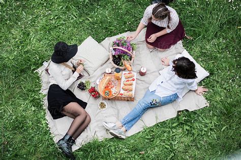 Group Of Female Friends Having Picnic In Nature By Stocksy Contributor Jovana Rikalo Stocksy