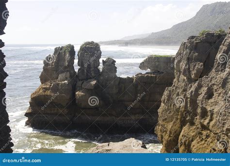 Hazy Ocean With Eroded Rocks Stock Image Image Of Drought Landmark