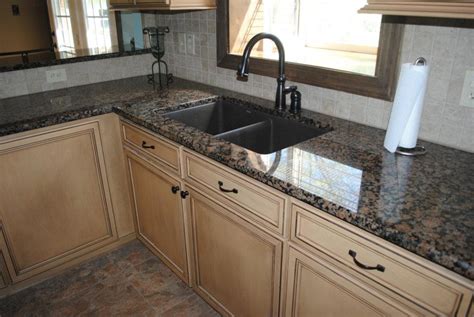 Baltic Brown Granite With Tile Backsplash Maple Cabinets Traditional