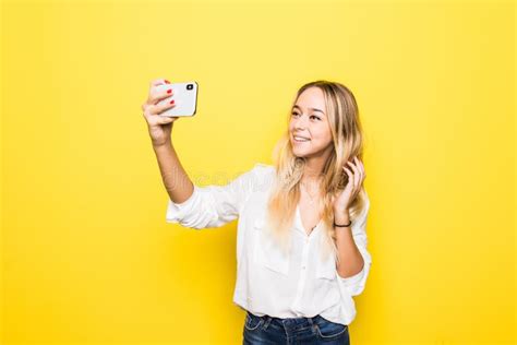 Portrait Of Woman Take Selfie Holding Phone In Hand Shooting Selfie On Front Camera Isolated On