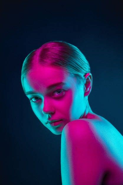 Free Photo Portrait Of Female Fashion Model In Neon Light On Dark
