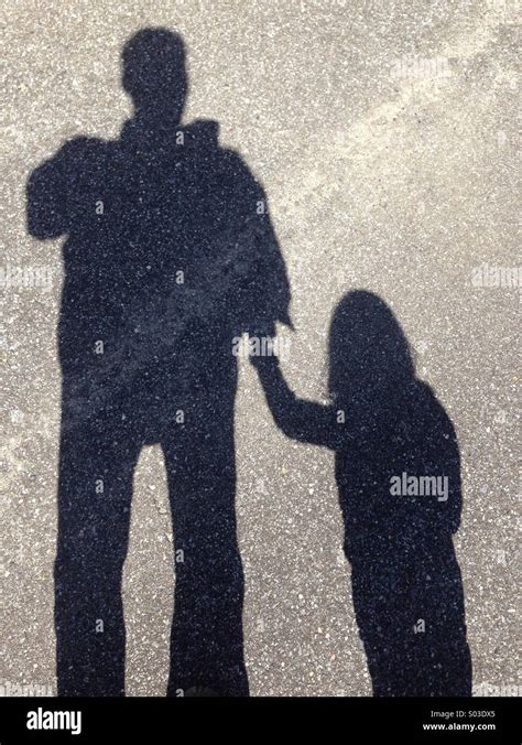 Father And Daughter Holding Hands Stock Photo Alamy