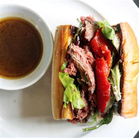 Mushrooms and port wine flavor the sauce for. yummy beef tenderloin french dip with homemade au jus. - The 2 Spoons