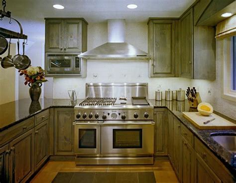 All it takes is some basic tools, elbow grease, and. Green stained kitchen cabinets - Video and Photos ...