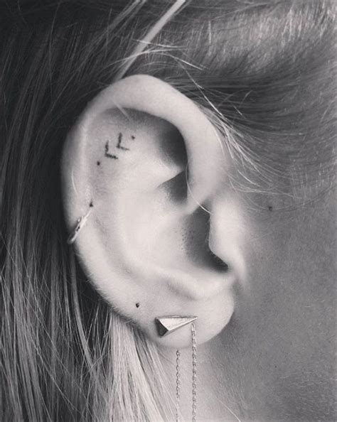 16 Tiny Ear Tattoos That Are Perfect For Minimalists Ear Tattoo