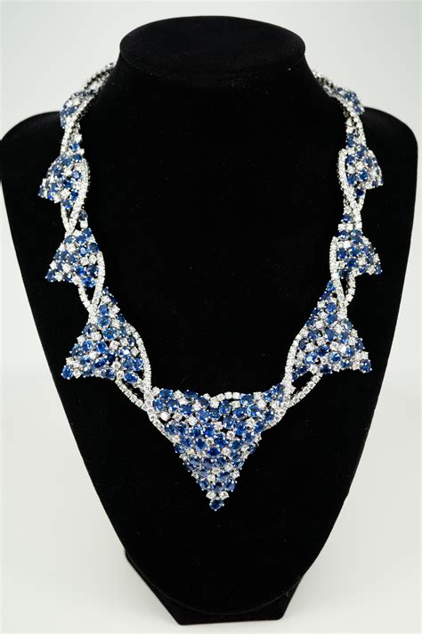 Yvel White Gold 2848 Carat Diamond 6965 Carat Blue Sapphire Necklace For Sale At 1stdibs