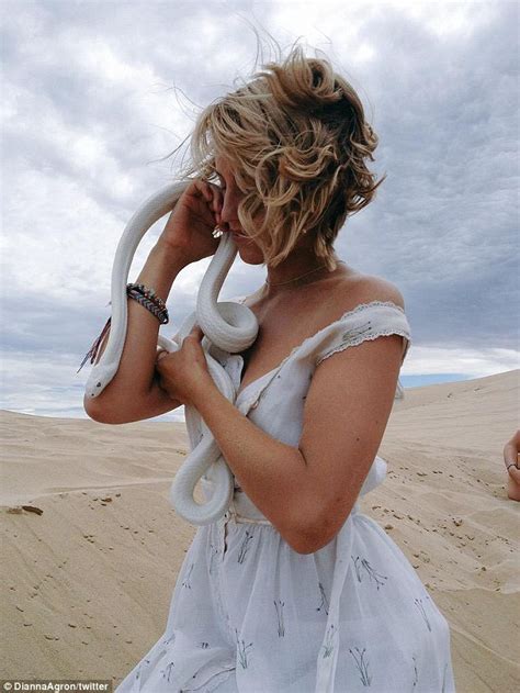 Dianna Agron Smoulders As She Hold A White Snake On Set Of Movie Bare