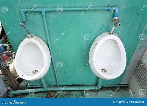 Urinal On Green Wall Stock Photo Image Of Indoor Green 143887950