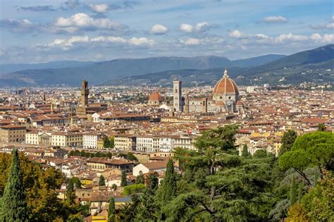 Florence Cityscape With Duomo Cathedral And Palazzo Vecchio Palace Over