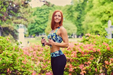 Portrait Of Redhead Fitness Female Holds Dumbbells Stock Image Image