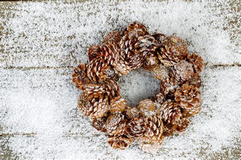 Natural Pine Cone Wreath On Snow And Wood Stock Photo Image Of