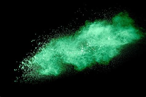 Premium Photo Green Color Powder Explosion Cloud On White Background