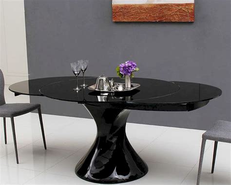 You may want a square wooden dining room table that can expand with a leaf when you have guests over for dinner. Round Extendable Lacquer Dining Table 44D2609XT-5