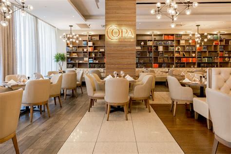 The rooms range from swanky studios with kitchenettes to extravagant suites with outdoor pools. COPA Restaurant at the Pepperclub Hotel in Cape Town