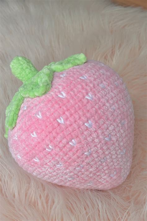 looking for a fun twist on classic strawberry plushies meet our salmon colored crochet