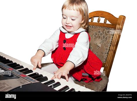 Little Girl Play On Piano Stock Photo Alamy