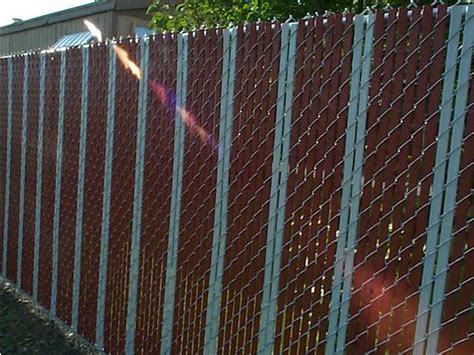 Chain Link Fence With Slats For Privacy Protection And Sound Barrier