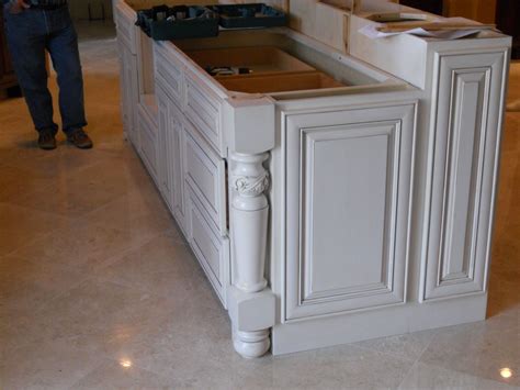 After removing the inner door panel with a jigsaw, paint the cabinet door and let dry. "Working" side of the island bar. Raised end-panels and a ...