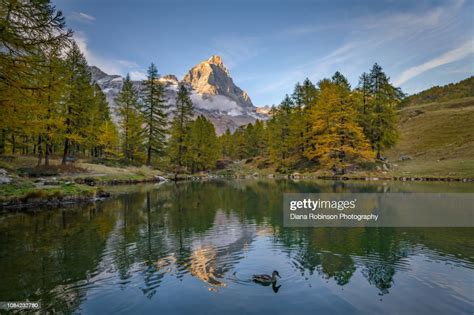 The Matterhorn On The Italian Side At Sunset Reflected In Lake Blue