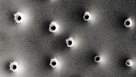 Premium Photo Bullet Holes In Metal Concept Use Of Firearms Close