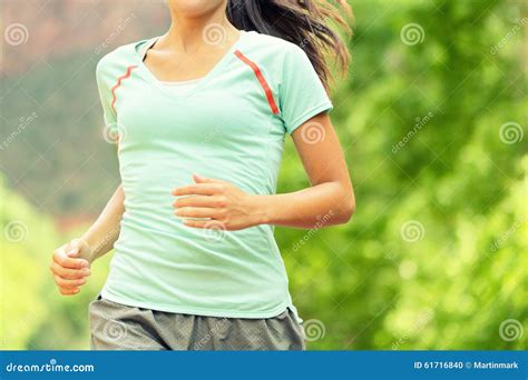 Running Woman Jogging On Sunny Day Midsection Stock Photo Image Of