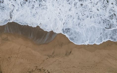 Download Wallpaper 1680x1050 Sea Beach Aerial View Wave Water Sand