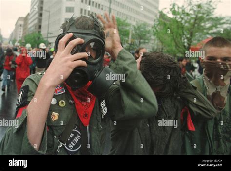 Punk Rock Protester Adjusting Mask Protesters Block Streets And