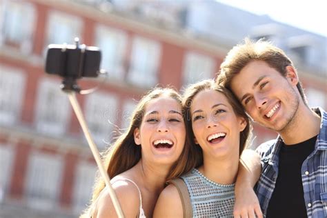 Group Of Tourist Friends Taking Selfie With Smart Phone Stock Image Image Of Holiday Adults