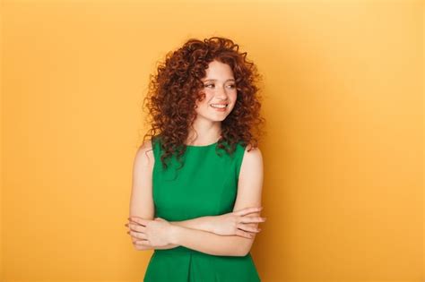 Premium Photo Portrait Of A Smiling Curly Redhead Woman