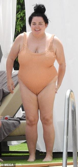 Scarlett Moffatt Dons An Orange Swimsuit For A Swim In Marbella Review Guruu