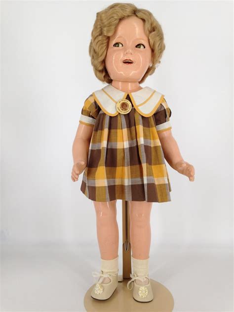 lot 25 ideal composition shirley temple doll marked on head and torso as shown mohair wig