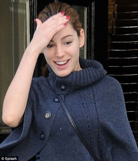 Kelly brook is used to wearing makeup. Not ready for my close-up! Kelly Brook emerges from house ...
