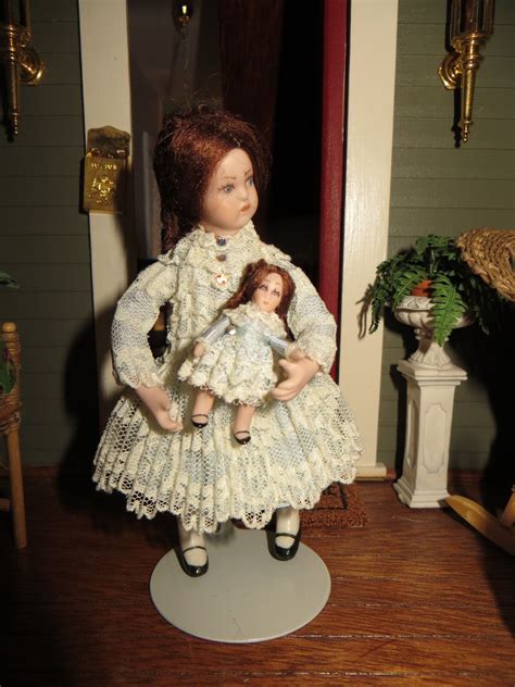 Unknown Artist Porcelain Girl Wearing Lace Carrying Porcelain Doll