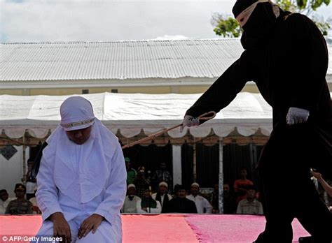 Woman Whipped In Indonesia Under Sharia Law Punishment Daily Mail Online