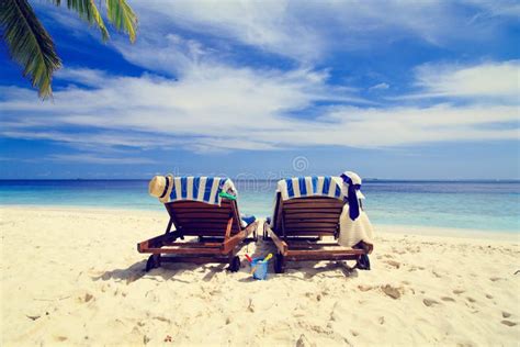 Two Chairs On The Tropical Beach Stock Image Image Of Chaiselounge