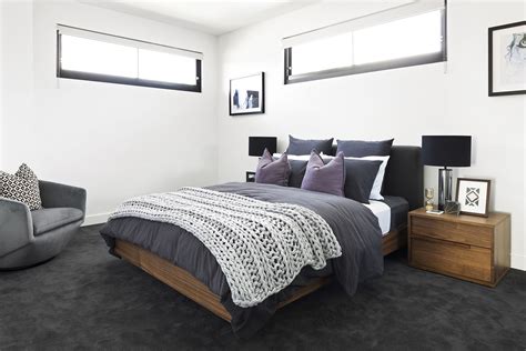 Master Bedroom With Dark Grey Carpet Brown Timber Bed And Grey Quilt