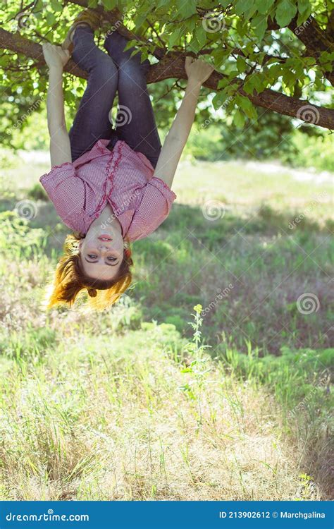 Girl Hanging Upside Down In A Tree Stock Photo Image Of Holiday Extraordinary